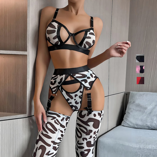Woman wearing a luxury white mesh 3-piece lingerie set with embroidery, including underwire bra, garter belt, and matching thong