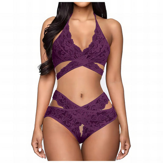 Woman wearing a purple mesh 2-piece lingerie set with embroidery, posing on a white background