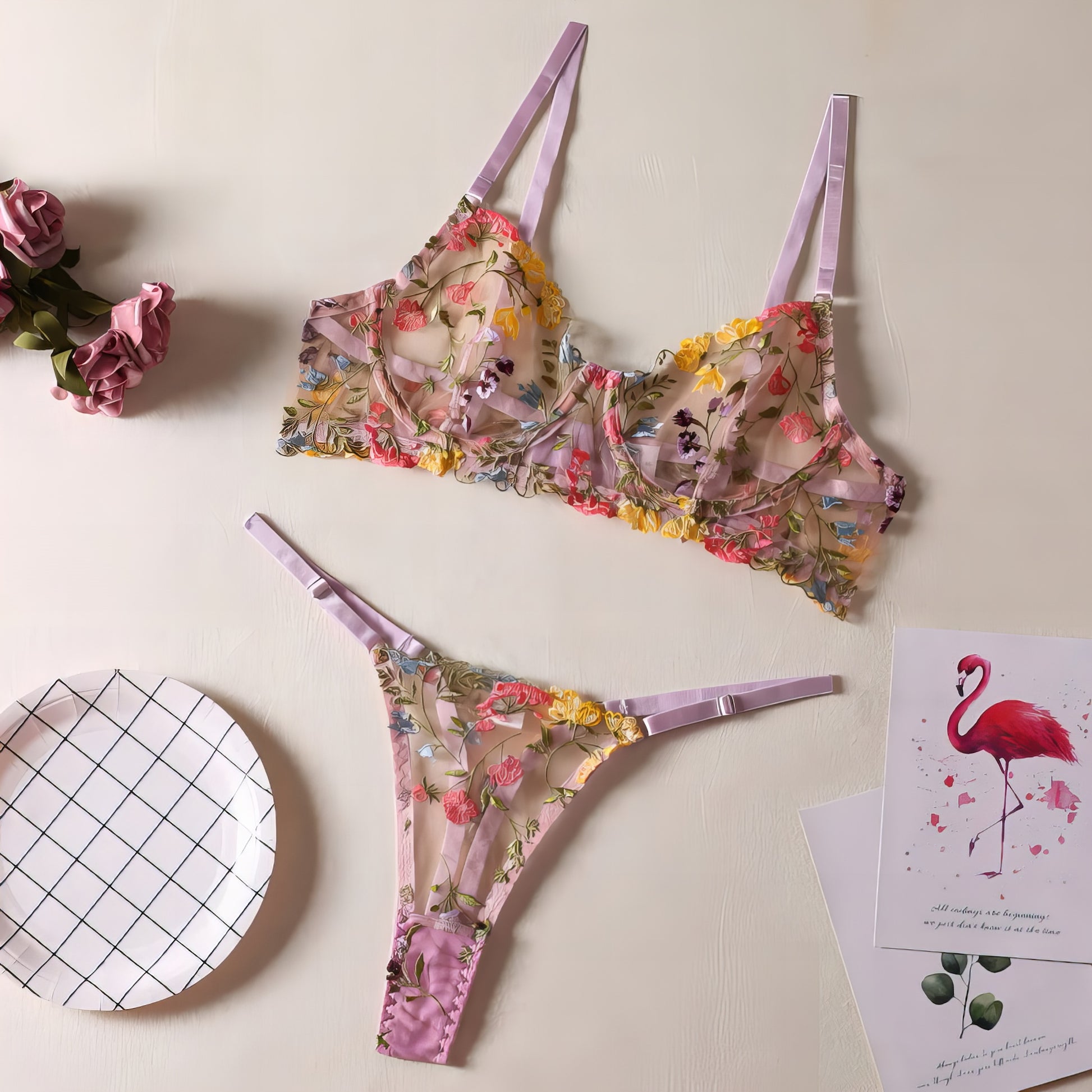 A purple mesh 2-piece lingerie set with color embroidery, posing on a white background