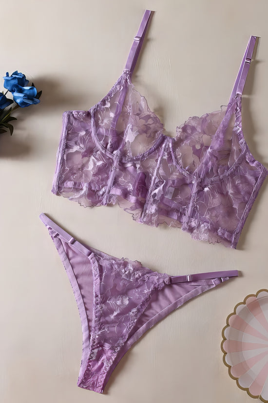  a purple mesh 2-piece lingerie set with embroidery, posing on a white background