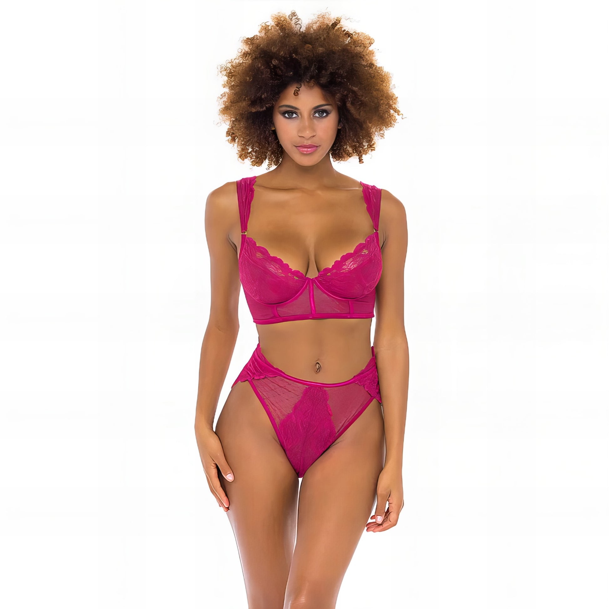 Woman wearing a pink mesh 2-piece lingerie set with embroidery, posing on a white background
