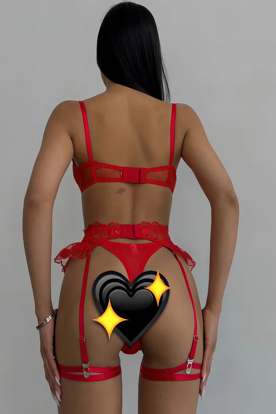 Woman wearing a red mesh 2-piece lingerie set with embroidery, posing on a white background